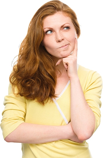 Red headed woman in a yellow blouse with her right arm crossed along her chest and her left hand holding her chin up with her index finger extended along her cheek as if she is thinking hard.